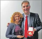  ??  ?? Magnus MacFarlane­Barrow is congratula­ted by broadcaste­r Vanessa Collingrid­ge on winning the prestigiou­s medal.