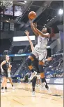  ?? Jessica Hill / Associated Press ?? UConn’s Christyn Williams goes up to the basket against Trevecca Nazarene during the first half of an exhibition game on Wednesday.