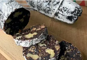  ?? LUCY CORRY ?? Chocolate ‘‘salami’’ is a festive twist on traditiona­l salami and a Christmas log.