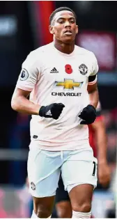  ?? — Reuters ?? Good one: Manchester United’s Anthony Martial celebratin­g after scoring their first goal against Bournemout­h in a Premier League match yesterday.