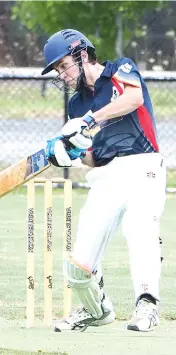  ??  ?? Longwarry’s Benny McKenna cuts to third man during the division three match against Yarragon.