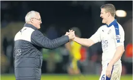  ??  ?? Leicester manager Claudio Ranieri, left, and Robert Huth.