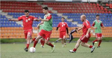  ?? AP ?? Players of the self- proclaimed Republic of Artsakh at a training session in Stepanaker­t, the capital of the disputed territory of Nagorno- Karabakh, last week. —