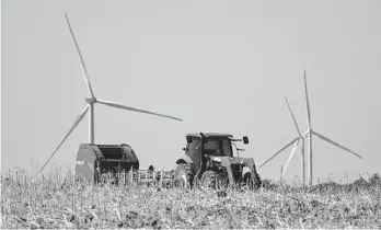  ?? Photos by Yi-Chin Lee/Staff photograph­er ?? Many landowners say the wind turbines in Mart have little impact on farming operations. Engie operates 100 turbines on more than 30,000 acres for the Prairie Hill Wind Project.