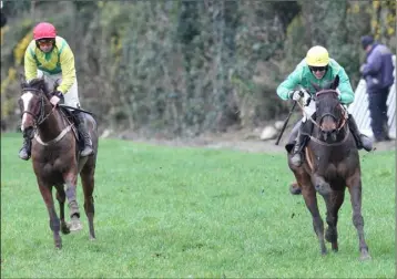  ??  ?? Barry O’Neill on Need to Know (right) claims victory ahead of Jamie Codd on Grand Jesture.