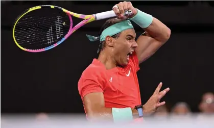  ?? William West/AFP/Getty Images ?? Rafael Nadal hits a return against Austria's Dominic Thiem during their men's singles match at the Brisbane Internatio­nal. Photograph: