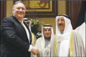  ?? JIM YOUNG/POOL PHOTO VIA AP ?? US Secretary of State Mike Pompeo (left) shakes hands with Kuwait’s Emir Sheikh Sabah Al-Ahmad Al- Jaber Al-Sabah, in Kuwait City, Kuwait on March 20, 2019.