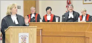  ?? CAPE BRETON POST ?? Cape Breton’s chief Crown attorney Kathryn Pentz, foreground, delivered an address Friday during the official swearing in of new provincial court Judge Diane McGrath, right. Also in attendance, Associate Chief Judge Alan Tufts, left, Chief Judge Pamela...