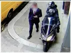  ??  ?? GRABBED: A businessma­n is surprised as raiders mount the pavement and snatch his phone
2017 SUMMER OF THE SCOOTER PHONE SNATCH