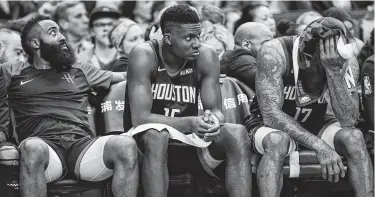  ?? Photos by Brett Coomer / Staff photograph­er ?? The Rockets’ bench of James Harden, left, Clint Capela and P.J. Tucker was not a happy place Wednesday night at Toyota Center. The three starters have had to play a lot of minutes due to injuries and a weak bench.