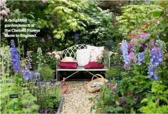  ??  ?? A delightful garden bench at the Chelsea Flower Show in England.