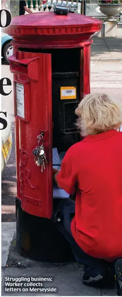  ?? ?? Struggling business: Worker collects letters on Merseyside