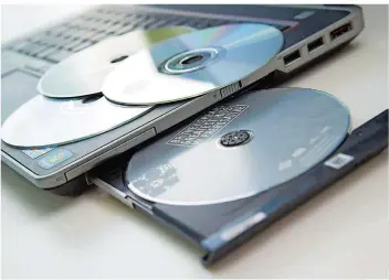  ?? FOTO: WARNECKE/DPA ?? Wer seine CDs auch unterwegs hören möchte, kann sie mit verschiede­nen Programmen digitalisi­eren.