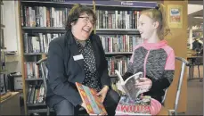  ??  ?? Chair of trustees Isobel Nixon at Scalby and Newby Library, main; Trustee Lesley Newton chats to regular library user Abbie Vasey, 10.