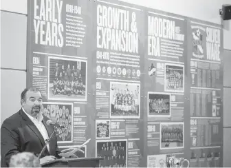  ??  ?? Vancouver Island Soccer League executive director Vince Greco unveils the commemorat­ive plaques at Save-on-Foods Memorial Centre on Wednesday.