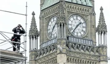  ?? PAUL CHIASSON/CP FILES ?? Security officials say they’re ready for the huge crowds set to descend on Parliament Hill for Canada’s 150th birthday celebratio­n Saturday.