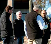  ??  ?? District mayors Ash Tanner and Toby Adams speak to National MP Scott Simpson, centre.