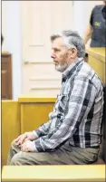  ?? TARA BRADBURY/THE TELEGRAM ?? Chris Snow, 68, of St. John’s sits in the dock in Newfoundla­nd and Labrador Supreme Court Wednesday afternoon prior to his sentencing hearing. Snow — known to local residents as the driver of the “Christmas truck” — will be sentenced next week on 12...