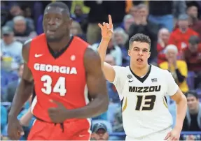  ?? BILLY HURST/USA TODAY SPORTS ?? Missouri’s Michael Porter Jr. had 12 points and eight rebounds in what was essentiall­y his college debut in the SEC tournament.