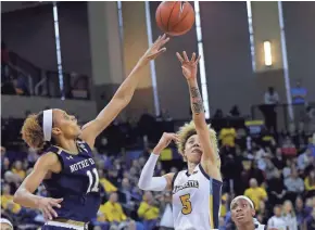  ?? RICK WOOD/MILWAUKEE JOURNAL SENTINEL ?? Natisha Hiedeman and the Marquette women’s basketball team remain ranked 10th in the latest AP top 25 poll.