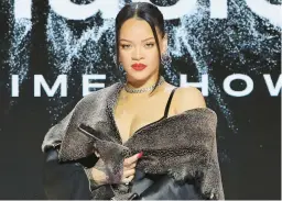  ?? MIKE COPPOLA/GETTY ?? Rihanna is seen Thursday at an event in which she discussed Sunday’s Super Bowl halftime show.