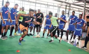  ?? CONTRIBUTE­D PHOTOS ?? Portmore United goalkeeper Shaven Paul (left foreground) going through training drills with teammates at Spry Training on Dunrobin Avenue, St Andrew, on Wednesday morning ahead of tonight’s Red Stripe Premier League grand final clash with Waterhouse FC...