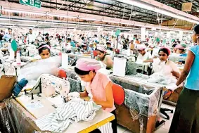  ?? ?? Workers at a Free Trade Zone garment factory