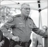  ?? Elias Valverde II
/The Dallas Morning News /TNS ?? Texas Department of Public Safety Director Steve Mccraw listens to a question from a reporter during a press conference outside Robb Elementary School in Uvalde,texas, on May 27.