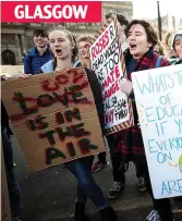  ??  ?? Solidarity: Hundreds of pupils at GLASGOW