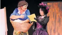  ?? Spiderella. ?? Widow Twankee (Les Frost) and Spiderella (Chontelle Von Hagen) on stage during Levin Little Theatre’s