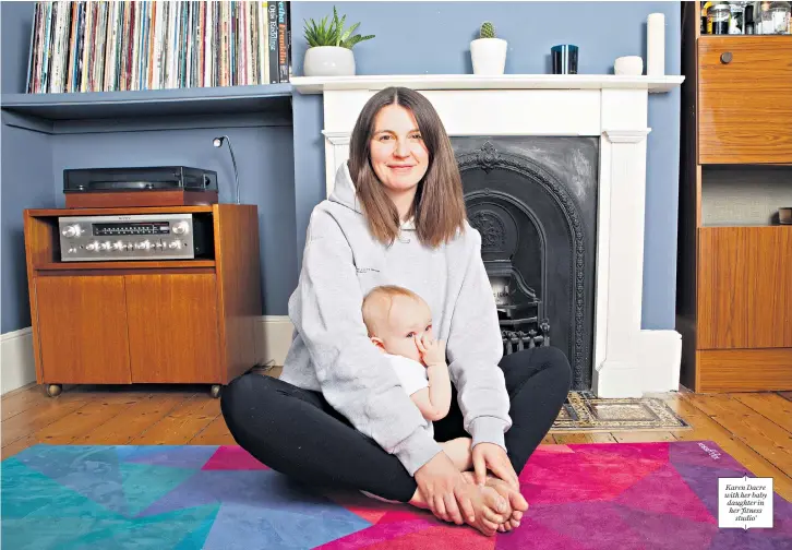  ??  ?? Karen Dacre with her baby daughter in her ‘fitness
studio’