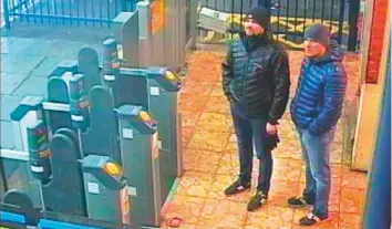  ?? AFP ?? Footage taken at the train station in Salisbury, west of London, shows Alexander Petrov (right) and Ruslan Boshirov, who are wanted by British police in connection with the nerve agent attack on former Russian spy Sergei Skripal and his daughter Yulia.