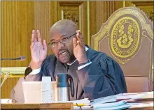  ?? PATRICK RAYCRAFT/THE COURANT VIA AP ?? Associate Justice Richard A. Robinson questions an attorney Sept. 28, 2017, during a session at Connecticu­t Supreme Court in Hartford. Gov. Dannel P. Malloy nominated Robinson for chief justice. If confirmed, he would succeed Chase Rogers.