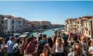  ?? ?? ‘Full of crowds and discomfort’: Tourists throng Venice’s famous Rialto Bridge. Photograph: Jumping Rocks/Universal Images Group/Getty Images