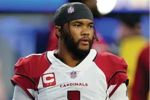  ?? The Associated Press ?? Arizona Cardinals quarterbac­k Kyler Murray warms up before a playoff game against the Los Angeles Rams on Jan. 17 in Inglewood, Calif. Murray has agreed to a long-term contract that will keep him with the Cardinals through the 2028 season.