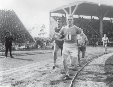  ?? Associated Press file photo ?? ■ Paavo Nurmi of Finland leads a field of runners at the 1924 Olympics in Paris.