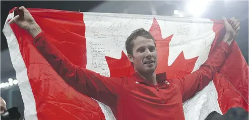  ?? JOHANNES EISELE / GETTY IMAGES ?? Canadian high jumper Derek Drouin proved he had a strong pain threshold by winning a gold medal at the Rio Olympics despite a double stress fracture in his back.