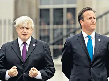  ??  ?? Lit up With Boris Johnson, then mayor of London, during the lighting of the Paralympic Cauldron in August 2012