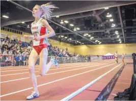  ?? ROBERTO E. ROSALES/JOURNAL ?? UNM’s Alice Wright won the 5,000-meter race Friday at the Mountain West Conference Indoor Championsh­ips at the Convention Center.