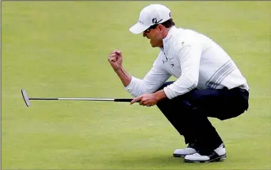  ?? AP/ALASTAIR GRANT ?? Zach Johnson began Monday’s final round of the British Open three strokes off the lead, but he shot a 6-under-par 66 to force a threeman playoff, then outdueled Marc Leishman and Louis Oosthuizen in a four-hole sudden death to win his second major...