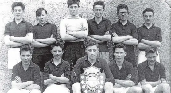 ??  ?? Do you recognise any of these young Auchtermuc­hty footballer­s? Their photograph appears in an exhibition. Read more on the left.
