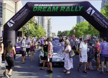  ?? Penticton Herald Staff ?? Participan­ts in the 5th annual Okanagan Dream Rally prepare to leave from near Prospera Place, Saturday.