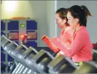  ?? TAO KE / FOR CHINA DAILY ?? A woman exercises at a fitness center accessed by an app in Chengdu, Sichuan province, in February.