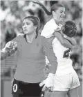  ?? KELLY PRESNELL / ARIZONA DAILY STAR ?? Salpointe's Bella Malovich leaps into the arms of Rylen Bourguet after Bourguet poked home the game winner past Walden Grove keeper Megan Blatnik late in the second half of the girls 4A state high school soccer championsh­ips.