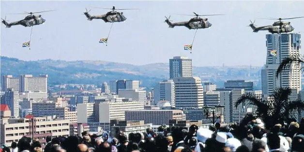  ?? Picture: Brooks Kraft LLC/Sygma via Getty Images ?? The helicopter fly-past at Nelson Mandela’s inaugurati­on.