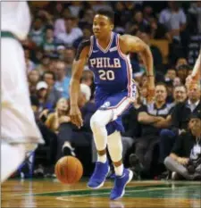  ?? THE ASSOCIATED PRESS FILE ?? Sixers rookie guard Markelle Fultz dribbles upcourt in an exhibition game in Boston Oct. 9. There is still no word on when Fultz will be on the floor for a game again, primarily because he’s seemed to have lost his shooting touch.