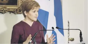  ??  ?? 0 Nicola Sturgeon has unveiled five- tier system