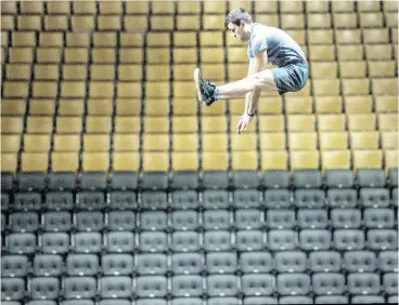  ?? PHOTOS: PETER J. THOMPSON / NATIONAL POST ?? Left, Cirque du Soleil’s Corteo suspended pole performer Stephanie Ortega of France practises at Toronto’s Scotiabank Arena. Right, a member of Cirque du Soleil’s Corteo show flies through the air while practising the teeterboar­d segment of the show.