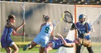  ?? APRIL GAMIZ/THE MORNING CALL ?? Emmaus’ Melea Weber takes a shot while being defended by Pleasant Valley’s Devon Bush and Madalyn Rakoski during Thursday’s game at Emmaus High School.