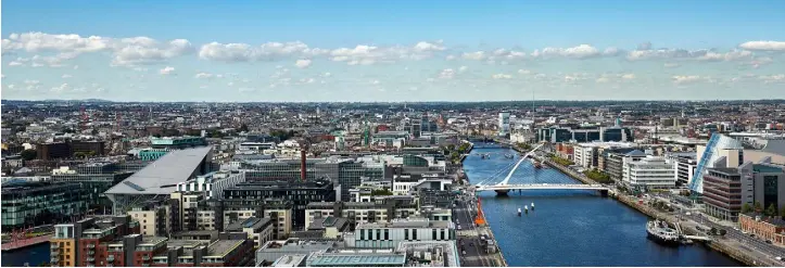  ??  ?? Ballymore and Oxley Holdings will launch the Dublin Landings developmen­t this week. Above, the city as seen from Capital Docks, which is currently being developed by Kennedy Wilson